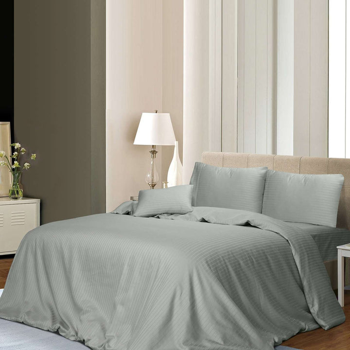 1000TC 3-piece silver pin stripe quilt cover set displayed on a queen-size bed in a modern bedroom."