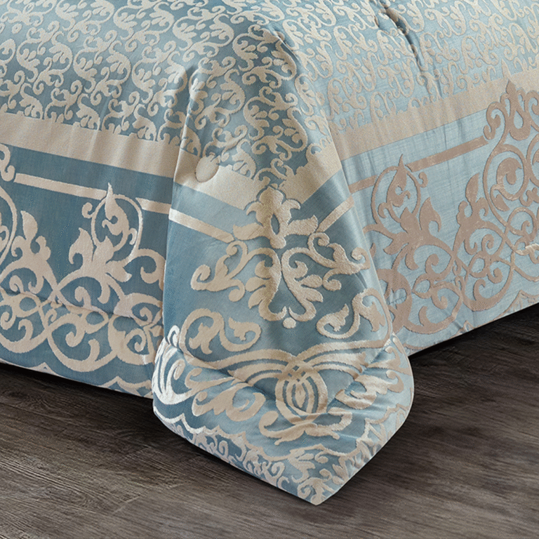 Luxury 10-piece silver blue bedding set with intricate damask designs and decorative matching cushions.