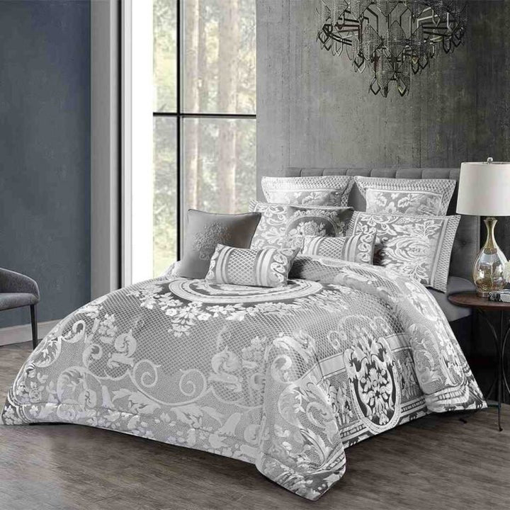 "10-piece luxury grey medallion bedding gift set styled on a queen bed in an elegant bedroom