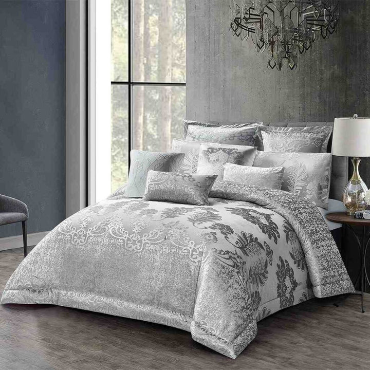 10-piece luxury silver damask bedding gift set styled on a king-size bed in an elegant master bedroom