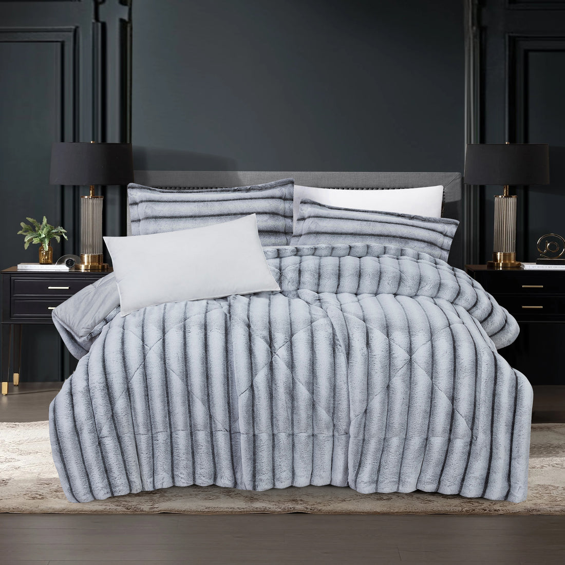 3-piece grey geometric pattern faux fur comforter set styled on a modern bed frame with matching pillowcases