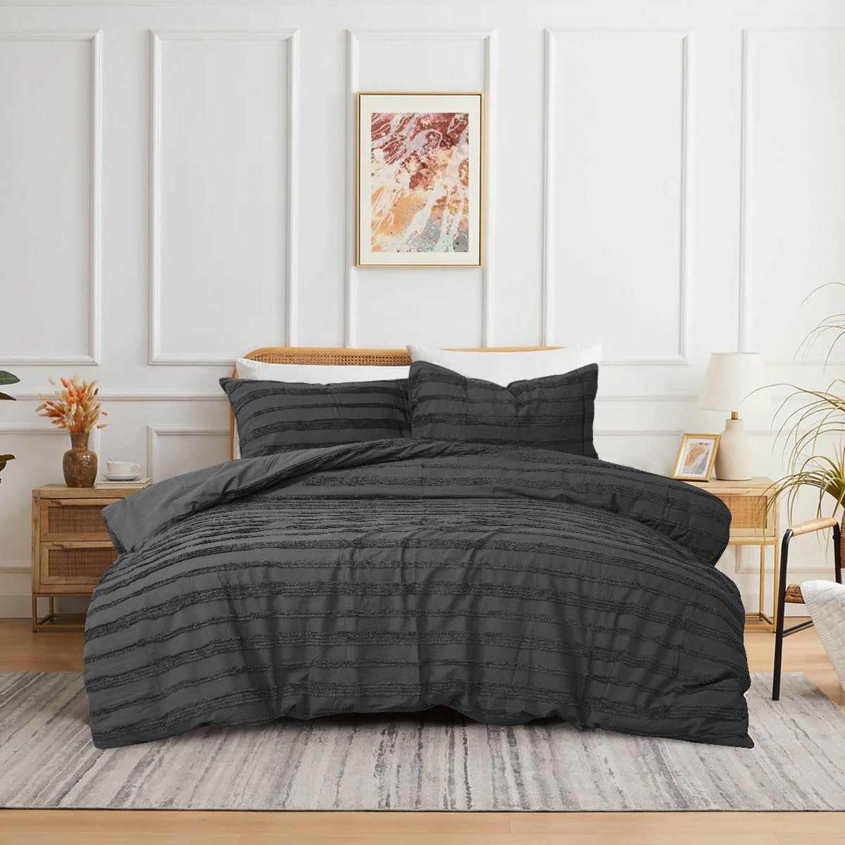 Black 3-piece tufted quilt cover set on a modern bed.