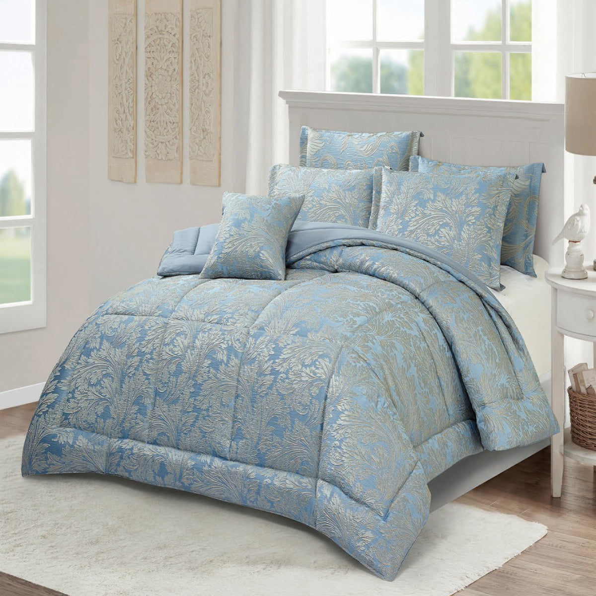 3-piece light blue jacquard comforter set with woven damask floral patterns on a bed