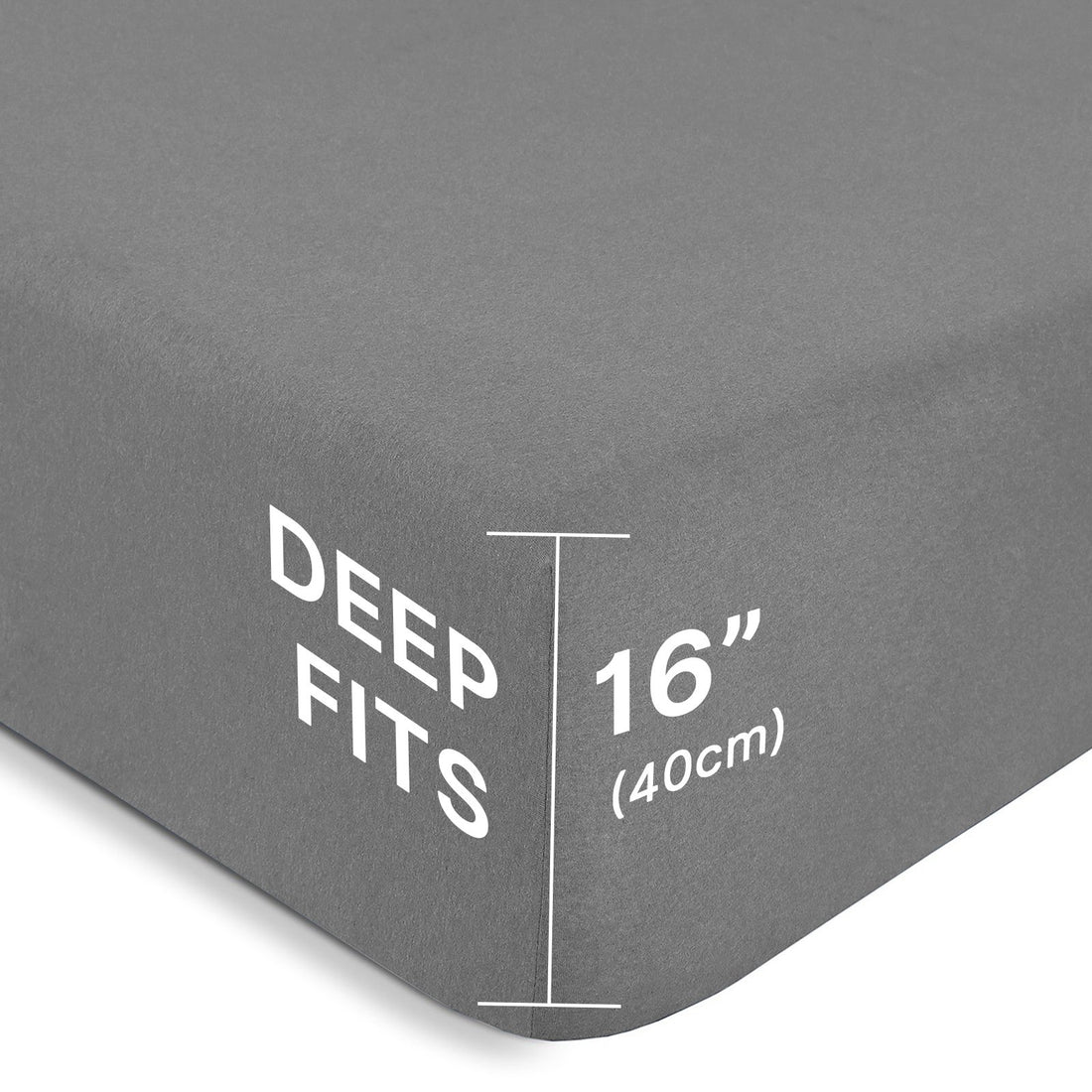 Corner angle view of a solid charcoal grey bamboo flat sheet draped neatly over a mattress.