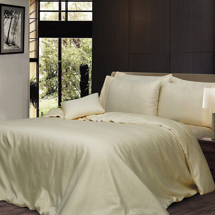 Cream 6-piece pure cotton striped quilt cover set styled on a modern bed.