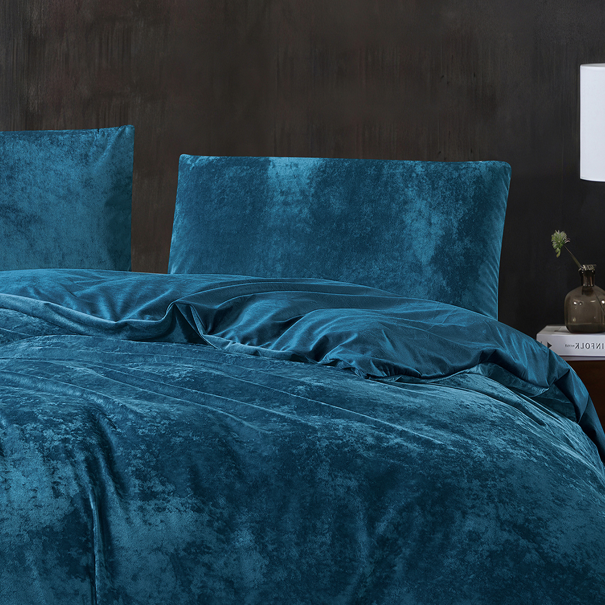 Soft dark teal velvet quilt cover with matching pillowcases.