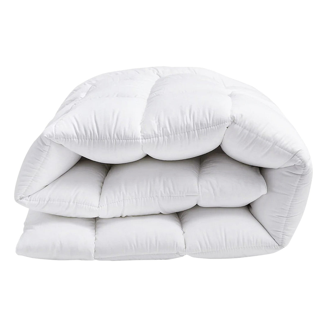 Close-up perspective of the fluffy, deep baffle-box cushioning and blue piping on a white mattress topper.