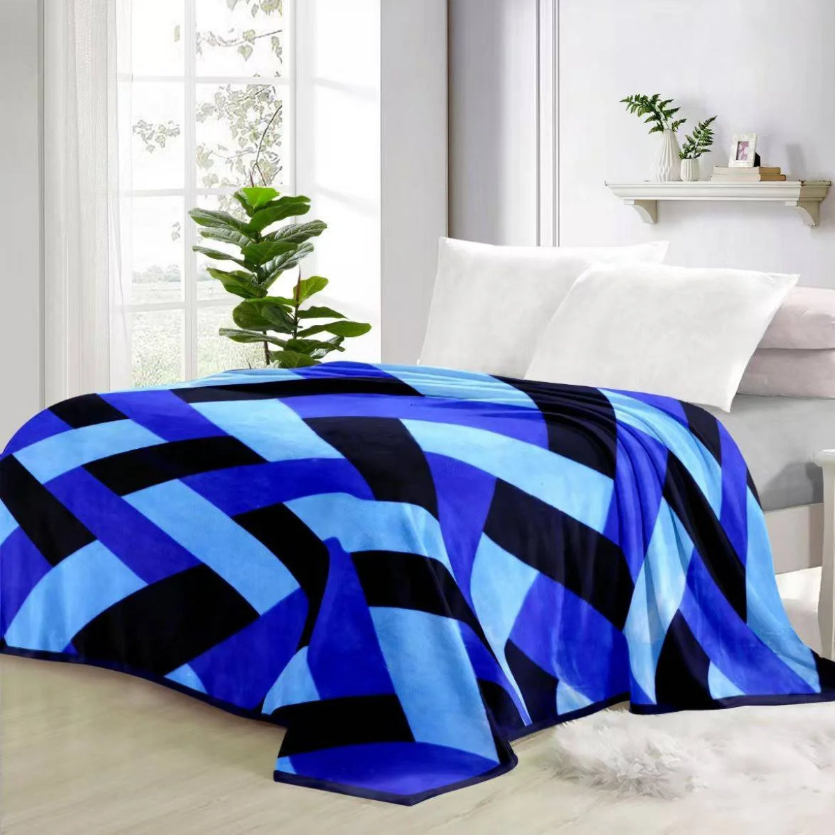 Super soft 3kg geometric blue and black mink blanket draped across a bed with white pillows.