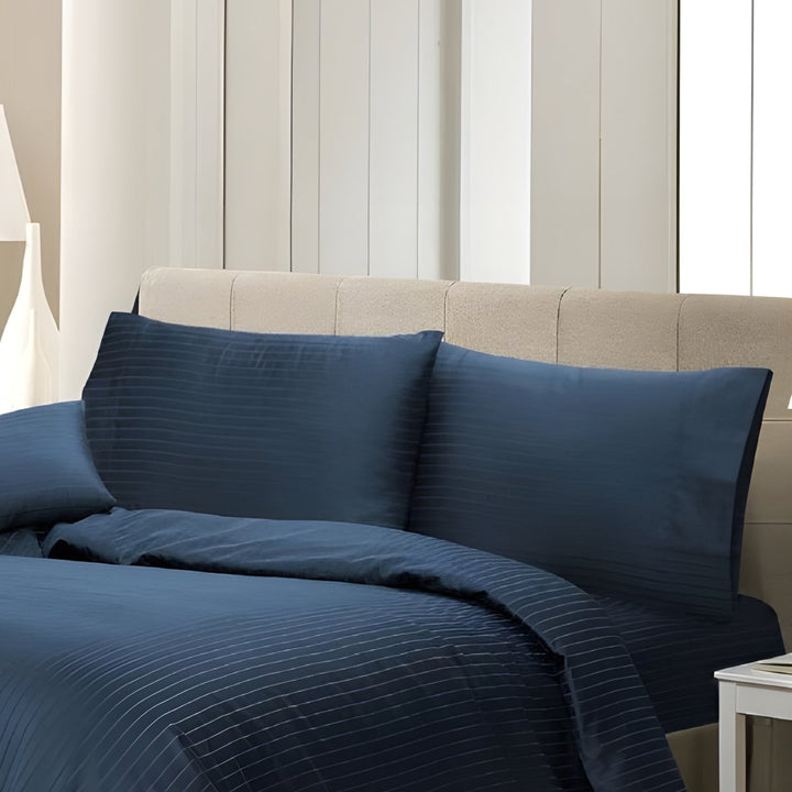 Luxury navy blue quilt cover showcasing a refined pinstripe design.