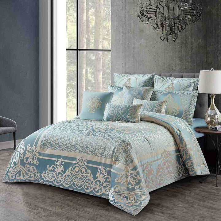 Silver blue damask bedding gift set featuring an elegant floral pattern and matching pillows on a luxury bed.