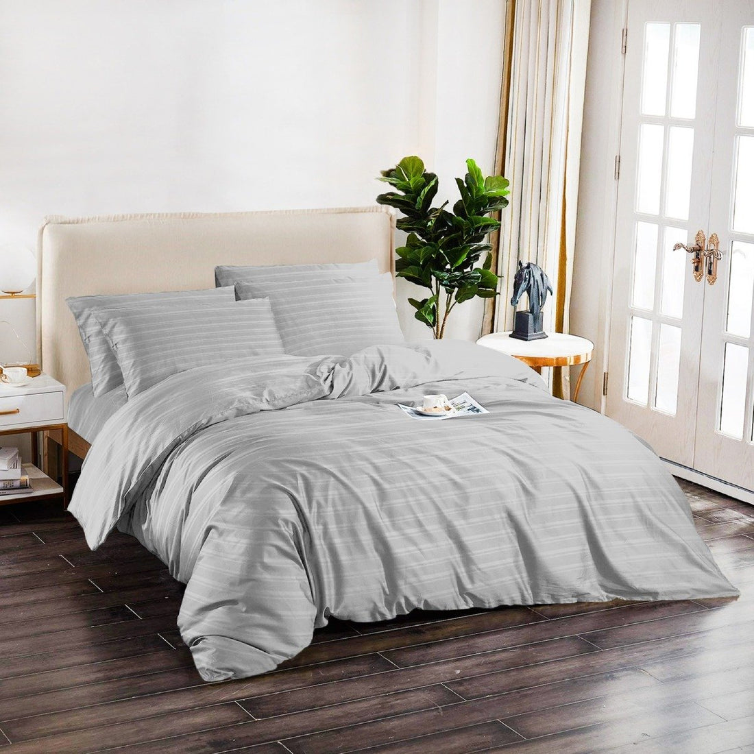 Silver grey 6-piece cotton quilt cover set styled on a modern bedroom bed.