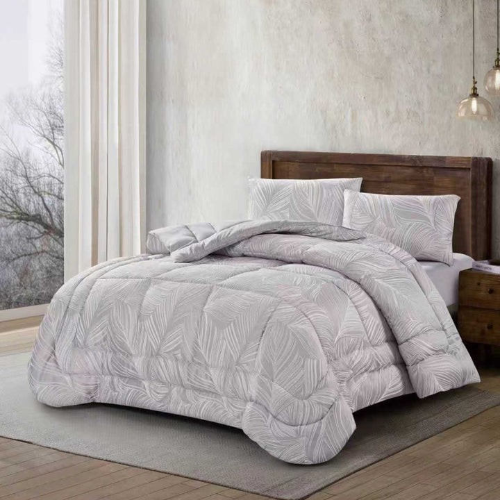 3-piece silver jacquard comforter set with delicate leaf pattern on a bed