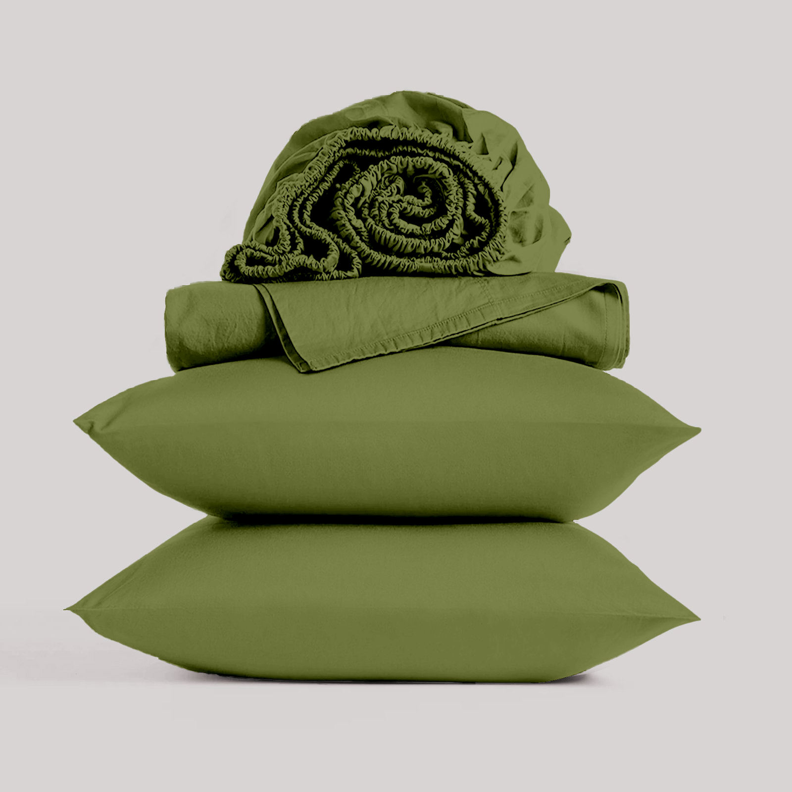 Stacked olive green bamboo pillowcases topped with a rolled bamboo sheet set isolated on a plain studio background