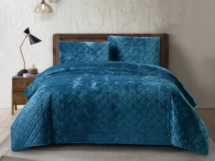 Teal blue crushed velvet bedspread set featuring a luxurious diamond quilted pattern.