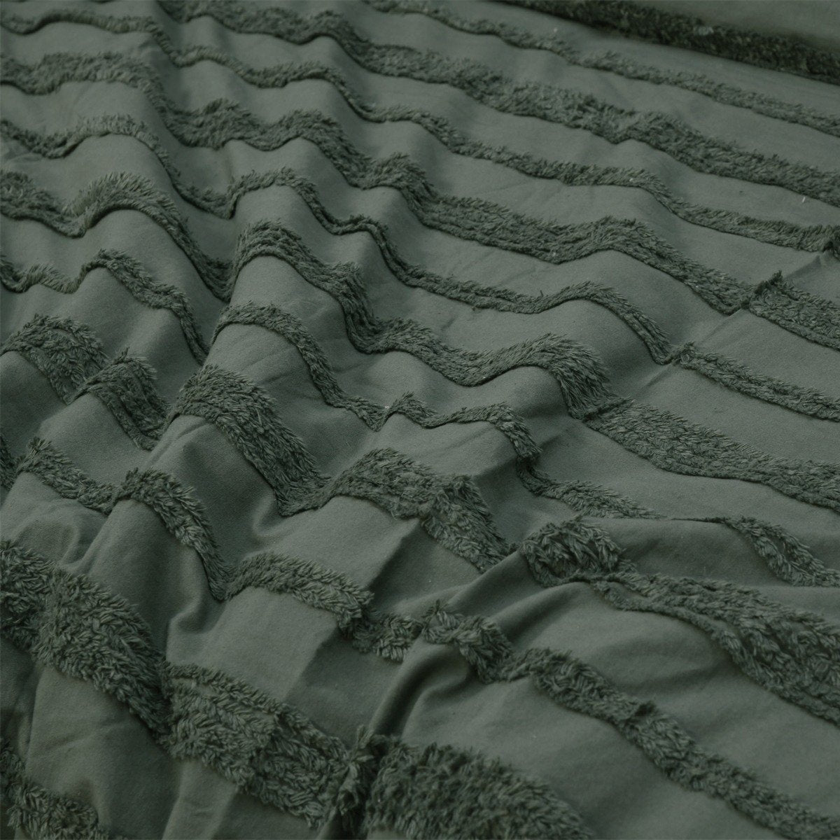 Olive green quilt cover set featuring a soft, wavy tufted design.