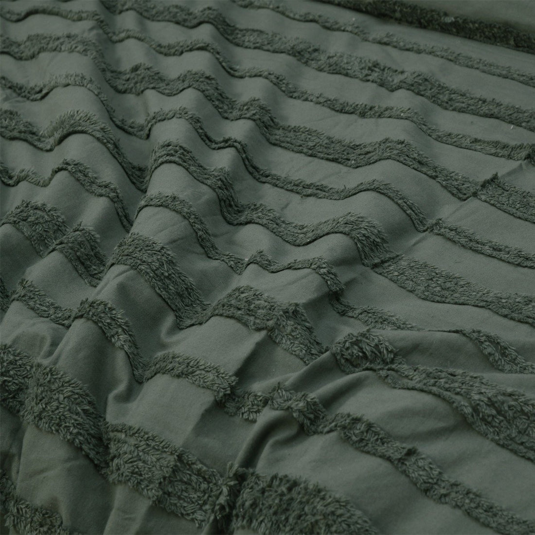 Olive green quilt cover set featuring a soft, wavy tufted design.
