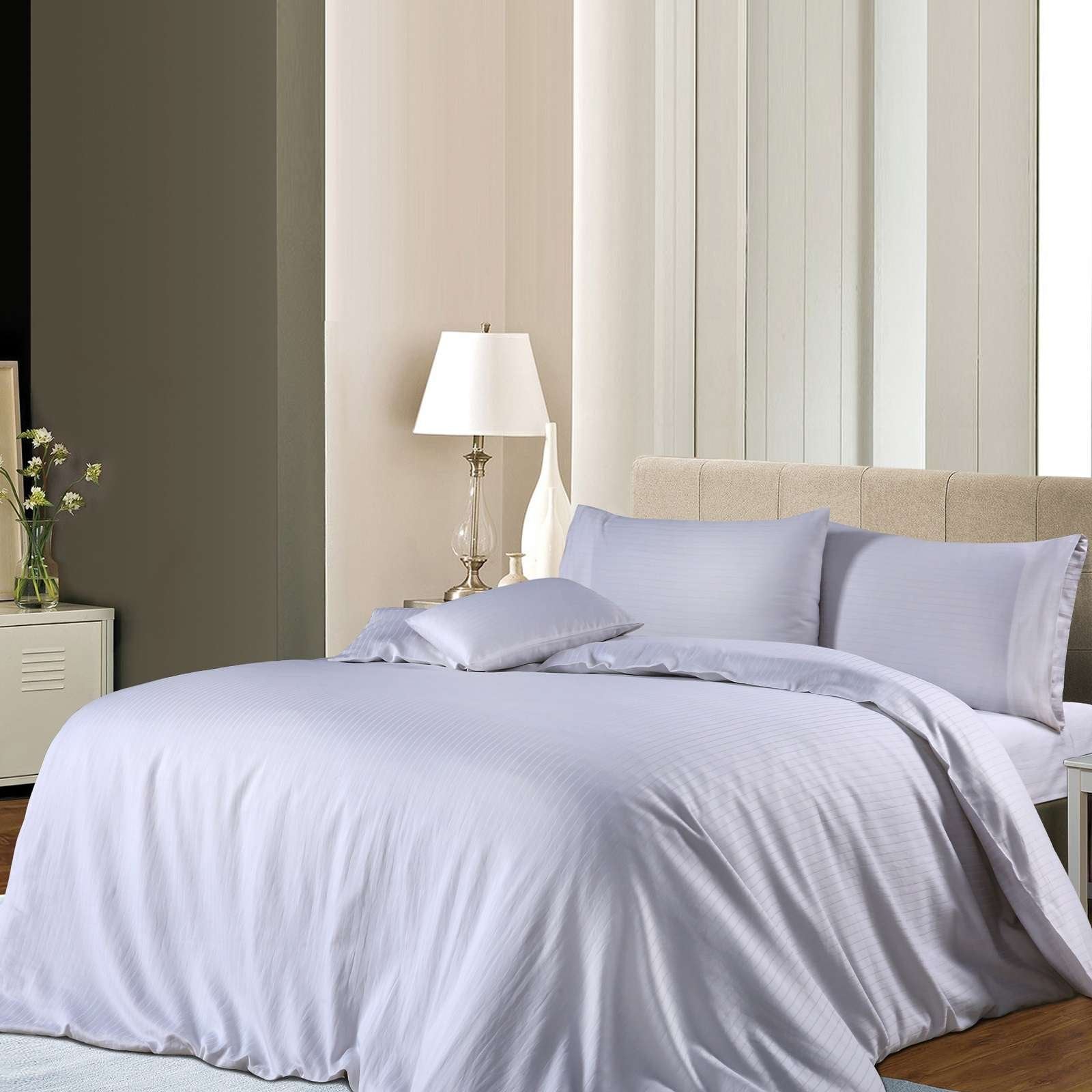 White 3-piece cotton pin stripe quilt cover set styled on a modern bed.