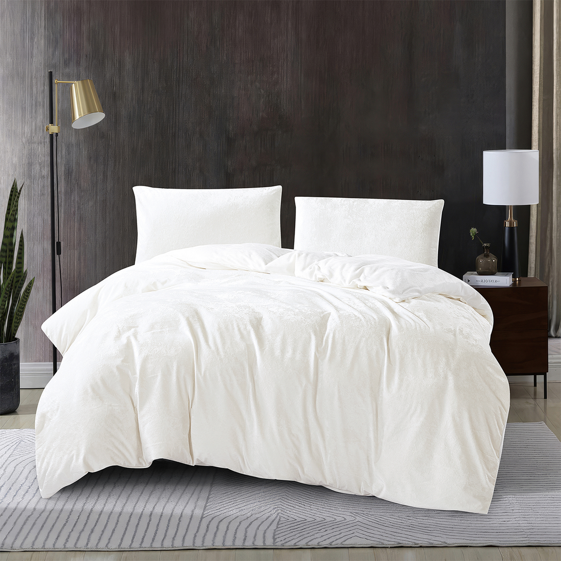 White 3-piece crushed velvet quilt cover set displayed on a modern bed.