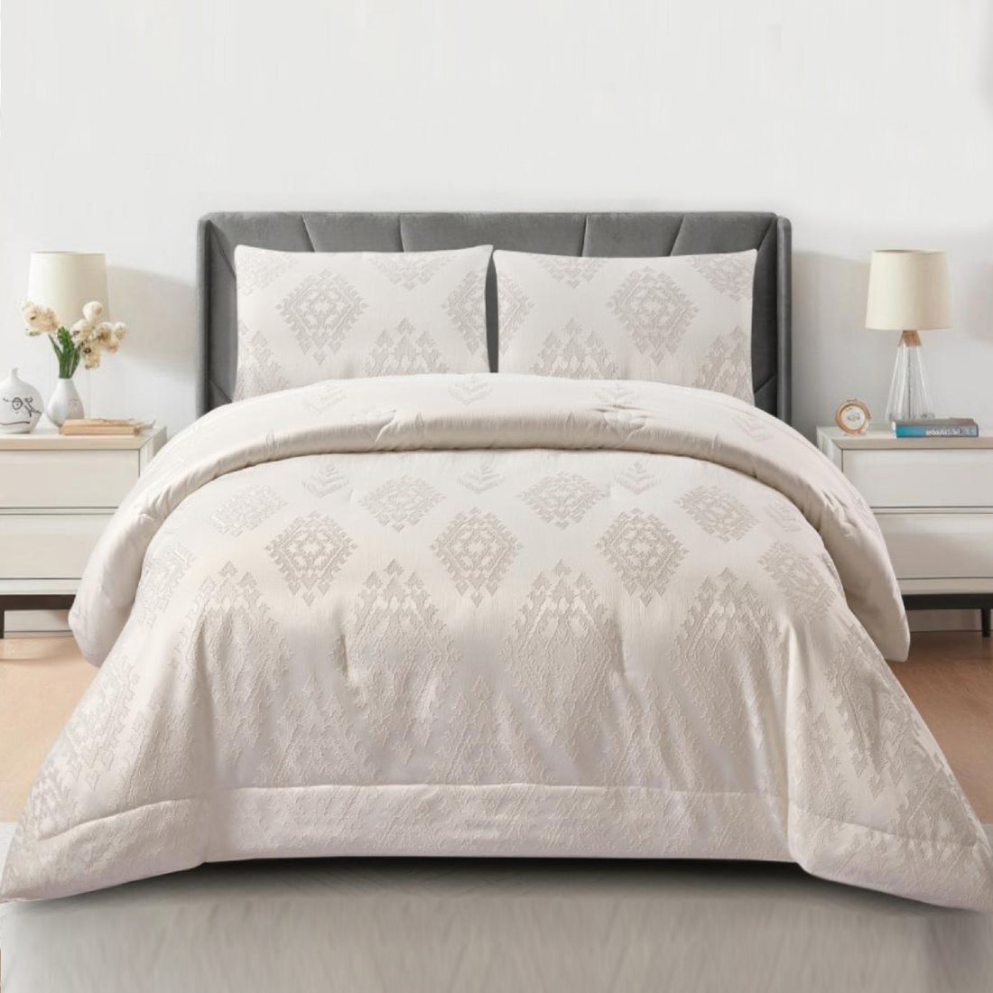 3-piece white jacquard comforter set with beige geometric diamond patterns on a queen bed