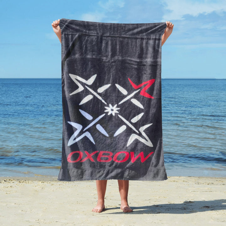 Black grey towel with flip flops