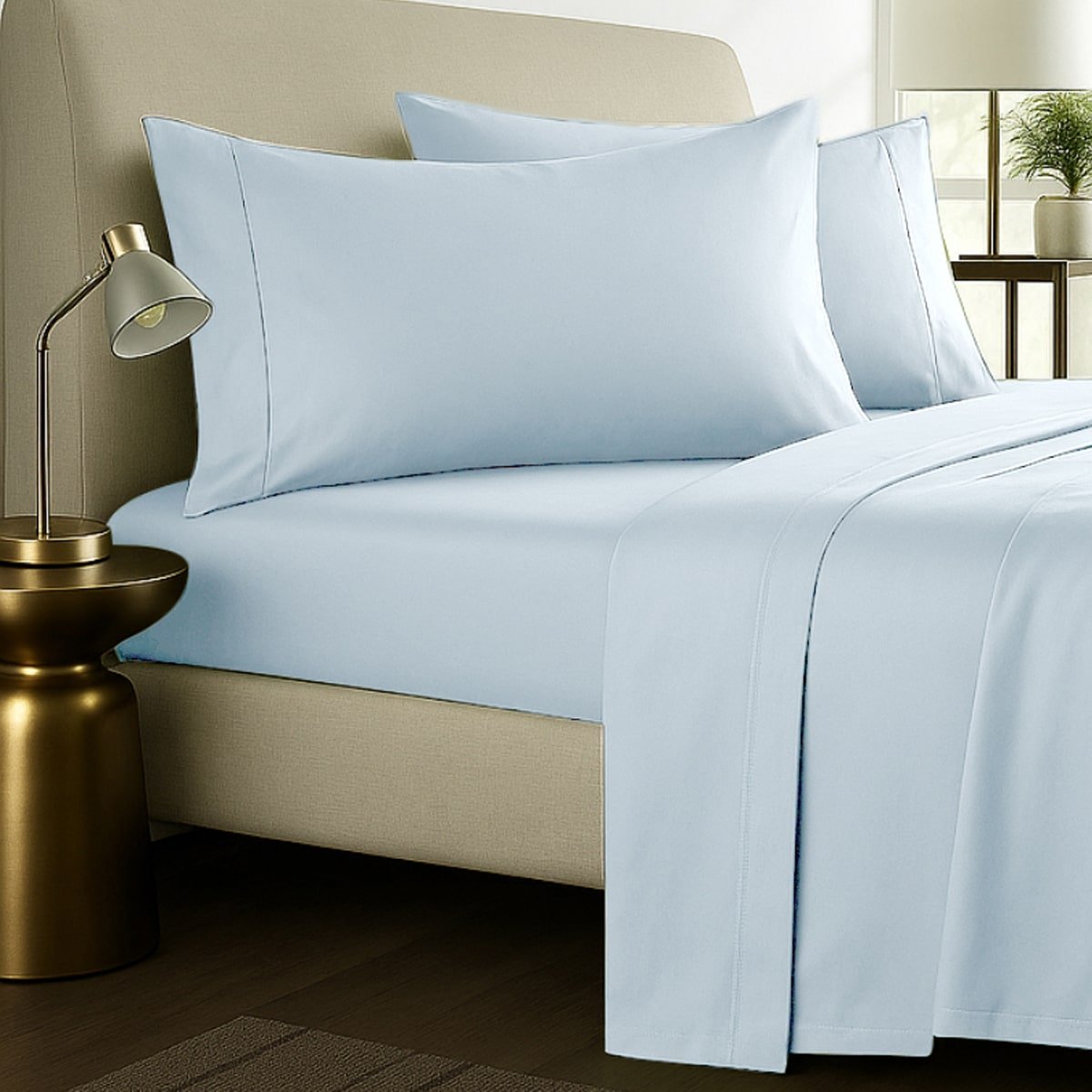 Pale blue bed sheets with pillows