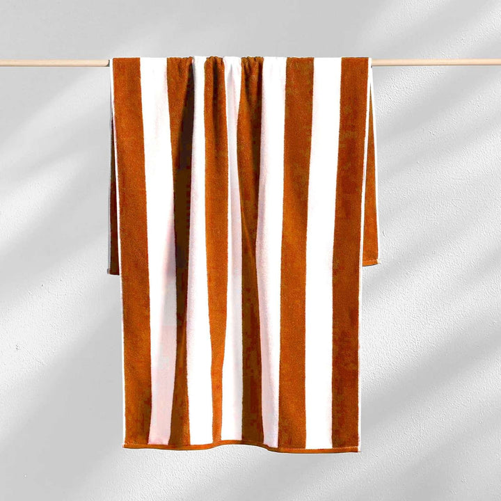Cabana style orange striped beach towel