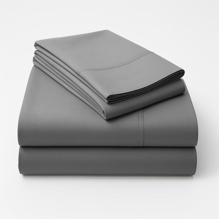 Folded charcoal cotton sheets stacked neatly