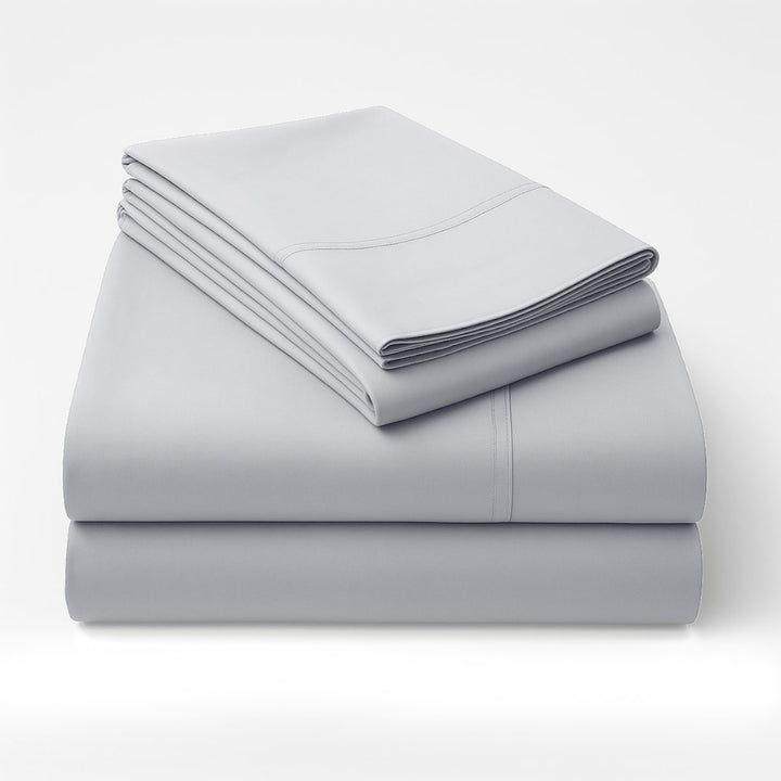Folded grey cotton sheets stacked stack