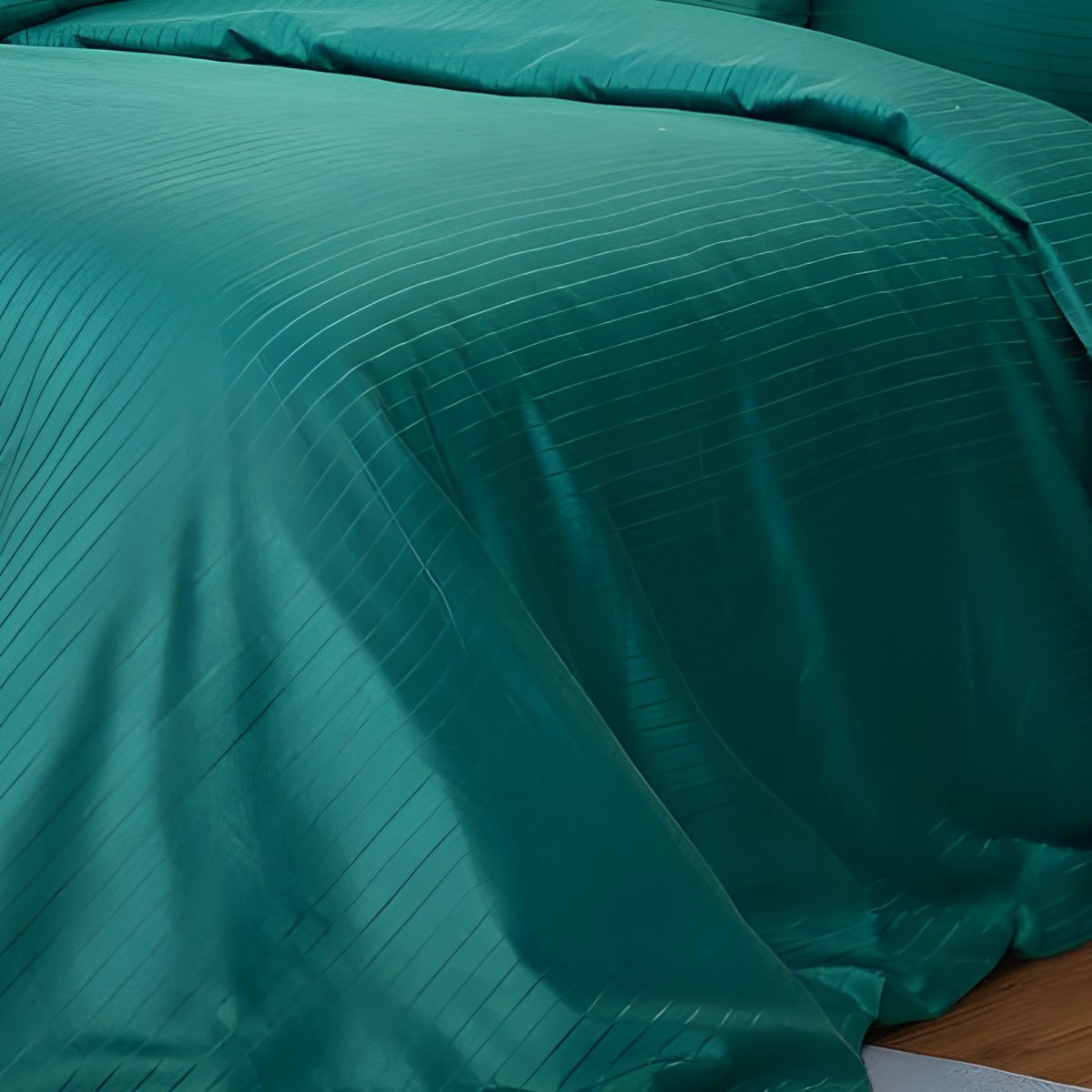 Modern queen bed arranged with luxury 6-piece teal stripe quilt cover and shams