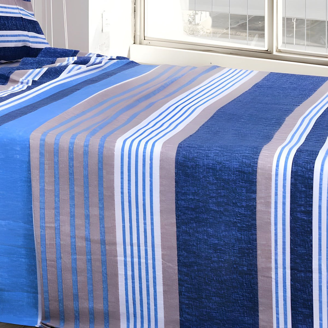 Overhead flat lay blue striped sheets