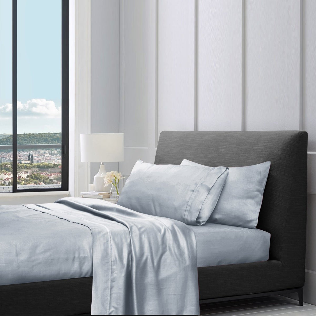 1200TC pure cotton sheet set in silver grey styled on a bed with pillows