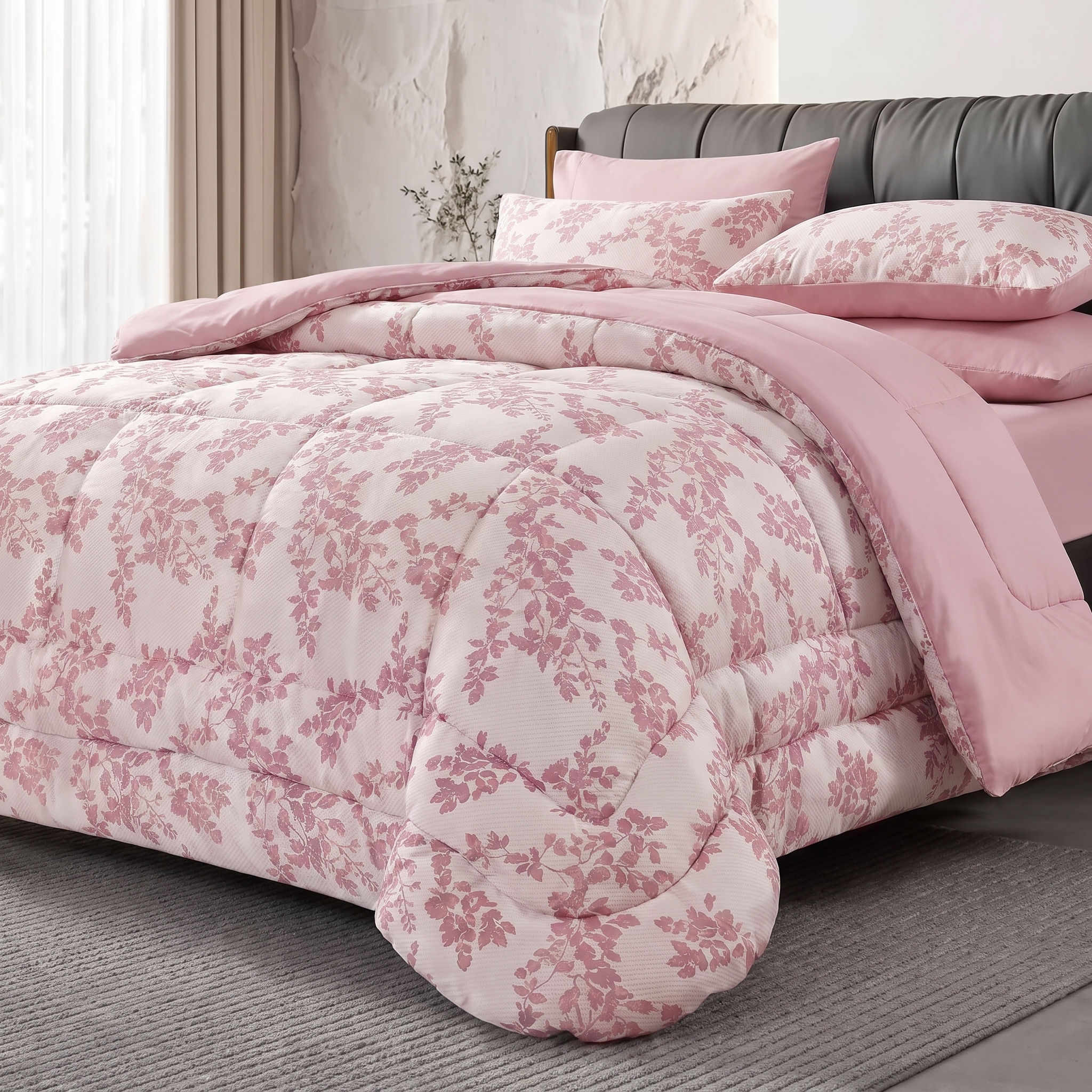 Modern grey tufted headboard paired with a soft pink floral jacquard comforter and pillowcases