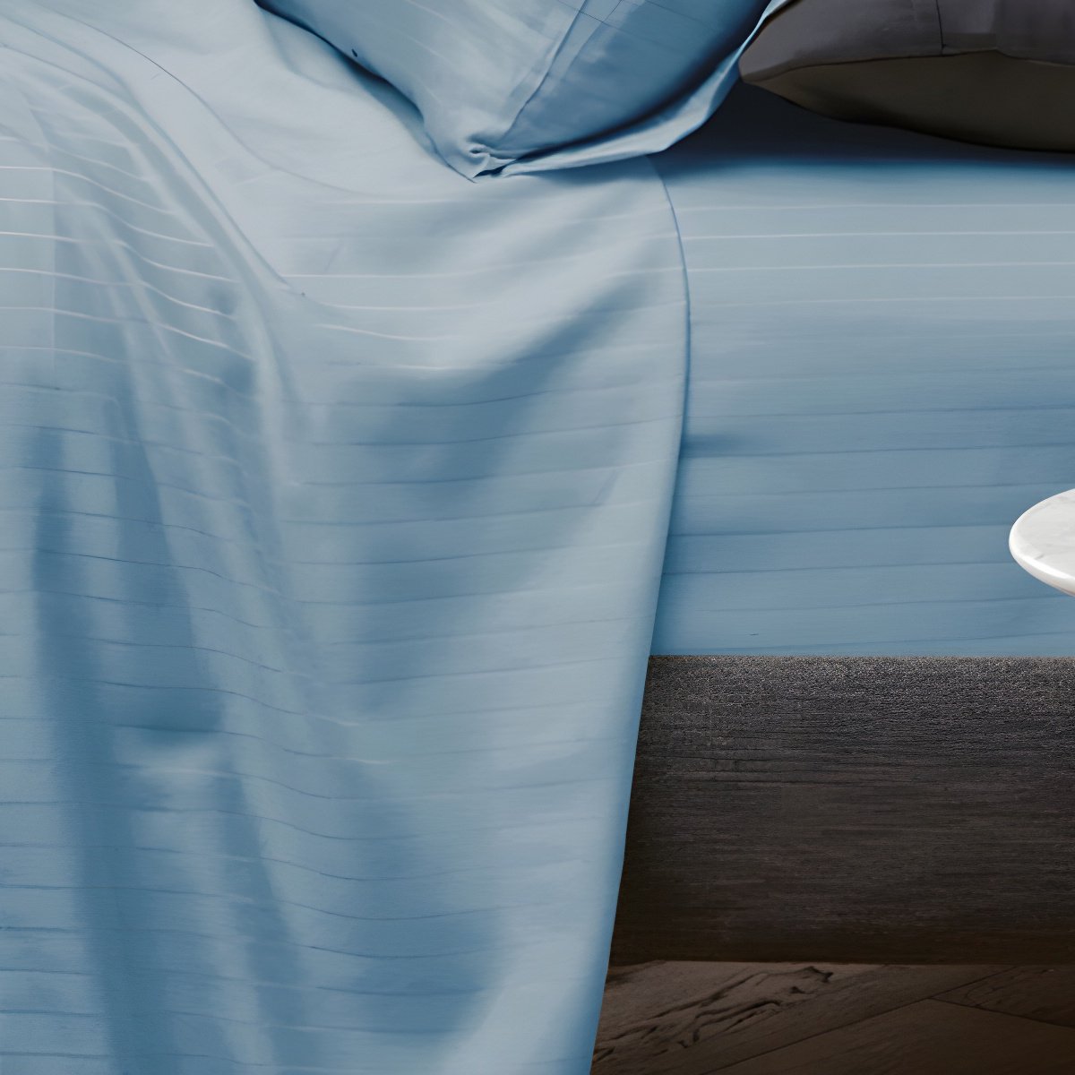 Overhead flat lay delphinium stripe sheets