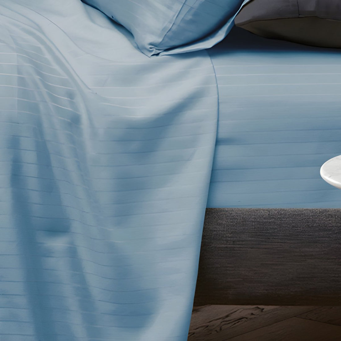 Overhead flat lay delphinium stripe sheets