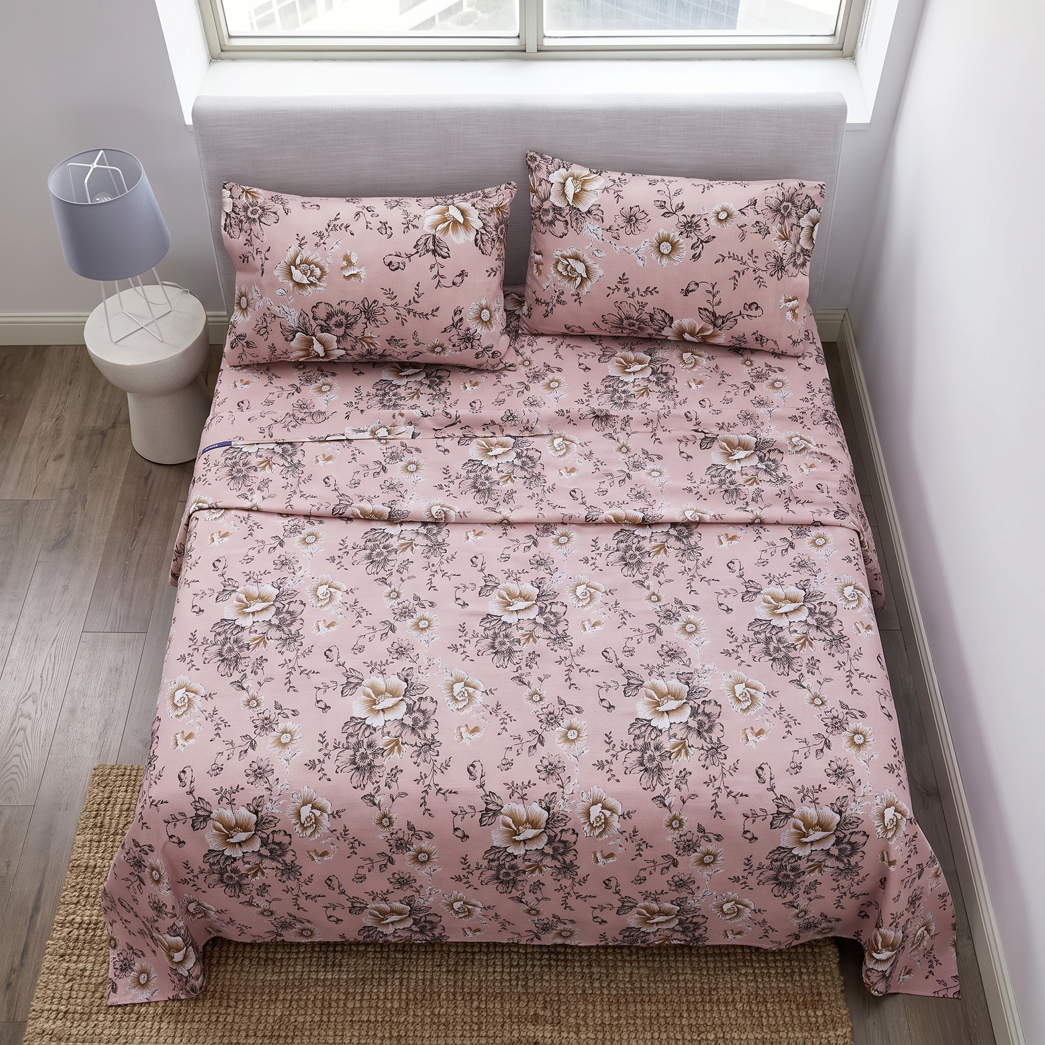 Overhead flat lay pink floral sheets