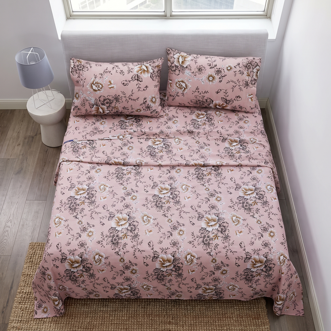 Overhead flat lay pink floral sheets